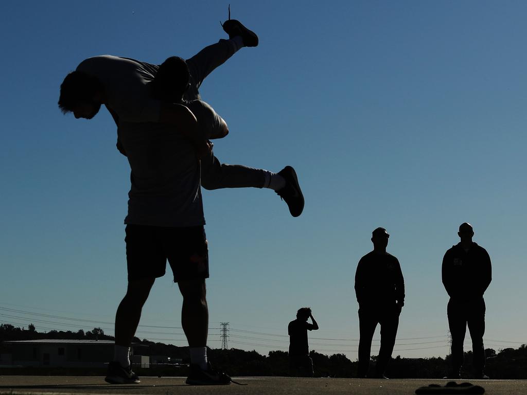 UFC fighter Rob Whittaker training at Wanda sand dunes, Cronulla. Picture: Brett Costello