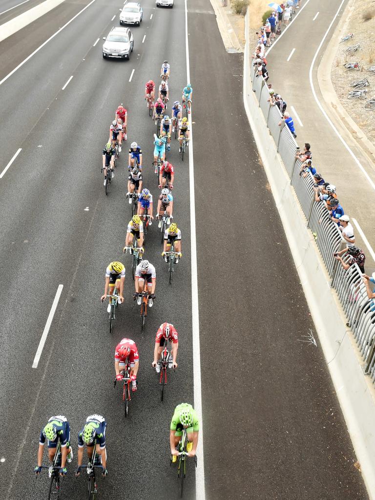 Riders cruise along the Southern Expressway early in the third stage of the 2016 Tour Down Under. Picture: Tom Huntley