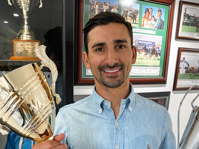 Trainer Michael Costa with the Pink Ribbon Cup trophies. Picture: Adam Gardini