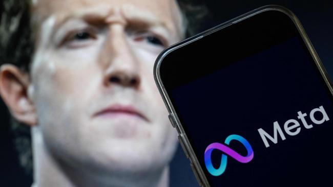 This photo illustration created on January 7, 2025, in Washington, DC, shows an image of Mark Zuckerberg, CEO of Meta, and a phone displaying the download page for the Facebook app. Social media giant Meta on January 7, 2025, slashed its content moderation policies, including ending its US fact-checking program, in a major shift that conforms with the priorities of incoming president Donald Trump. (Photo by Drew ANGERER / AFP)