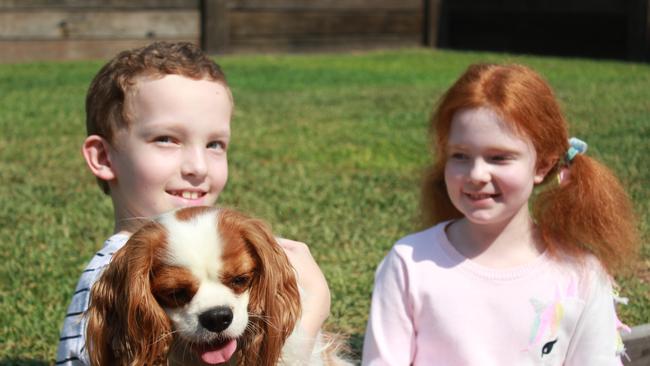 Emily (right) helped ambulance officers after her brother Liam (left) suffered a shocking seizure. Photo. Andrea Macleod.