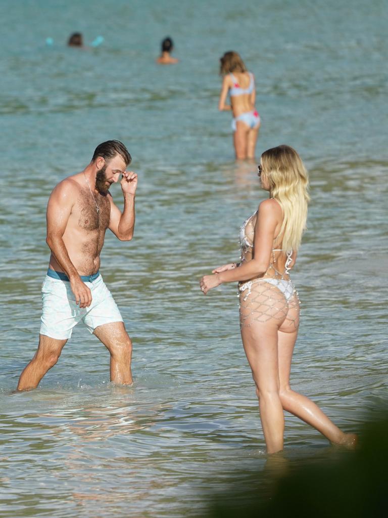 Paulina Gretzky and Dustin Johnson frolic in the Caribbean sun. Picture: Splash News and Pictures.