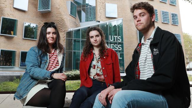 UTS honours students Siena Nisavic, Miranda Crossley and Liam Foster Constable are concerned about their futures. Picture: John Feder