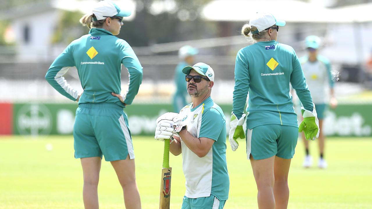 Australian coach Matthew Mott and captain Meg Lanning talk tactics at training. Picture: Albert Perez / Getty Images