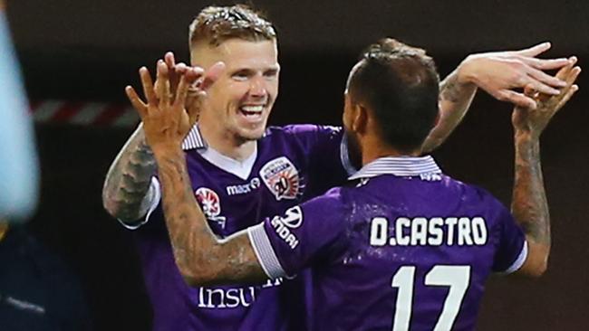 Andy Keogh celebrates a goal with Diego Castro. (Photo by Michael Dodge/Getty Images)