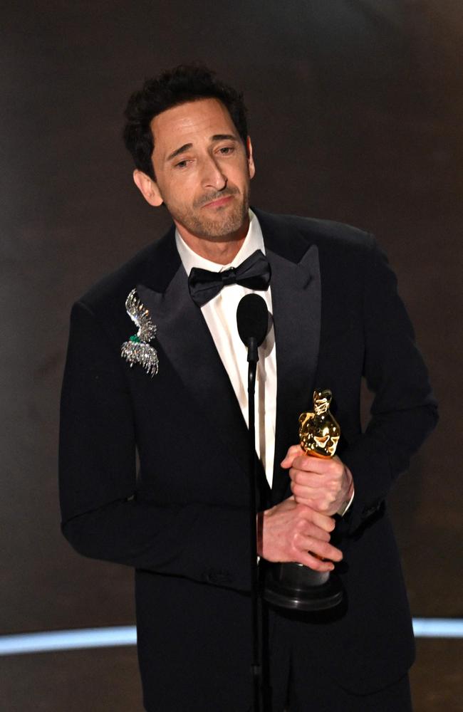 Adrien Brody accepts the award for Best Actor in a Leading Role for ‘The Brutalist’. Picture: Patrick T. Fallon / AFP