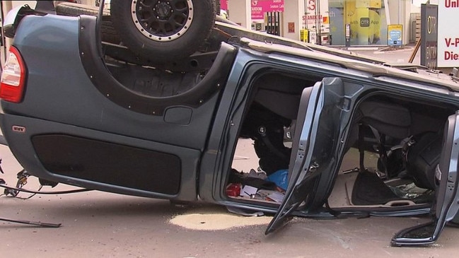 A ute has collided with a truck and rolled into a service station with a baby on board. No serious injuries. Picture: 7NEWS Adelaide