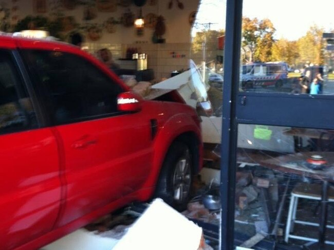 Kerferd Rd, Albert Park crash into cafe window 2013.