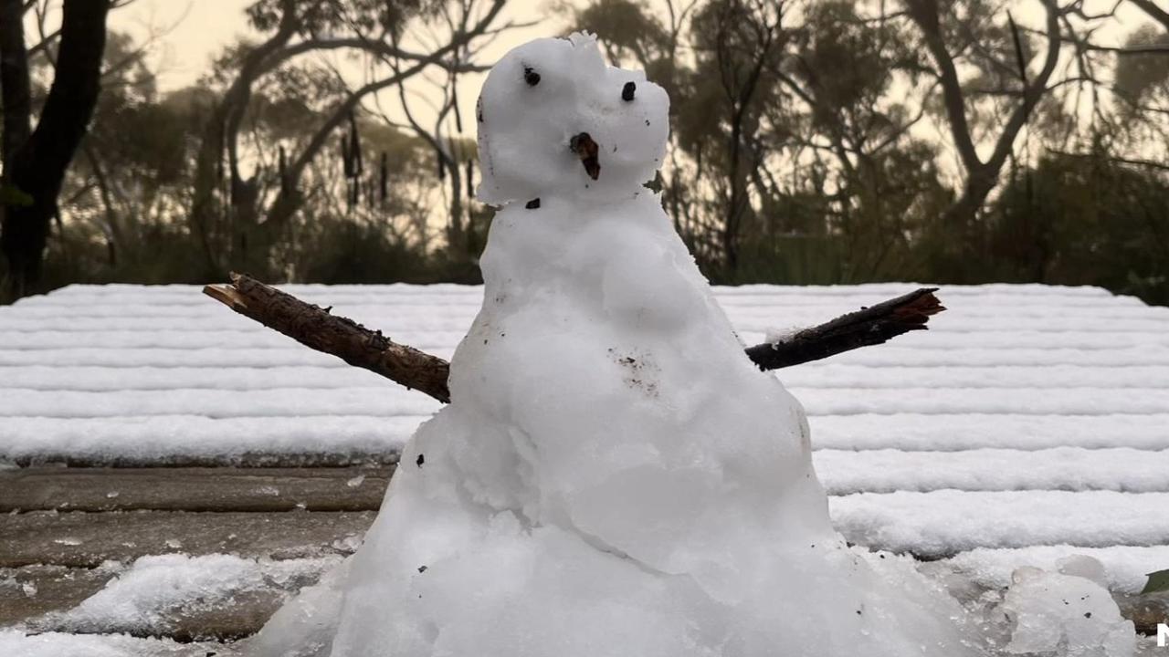 Snow falls in South Australia as Adelaide breaks rain records