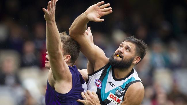 Paddy Ryder rucks against Sean Darcy before being injured.