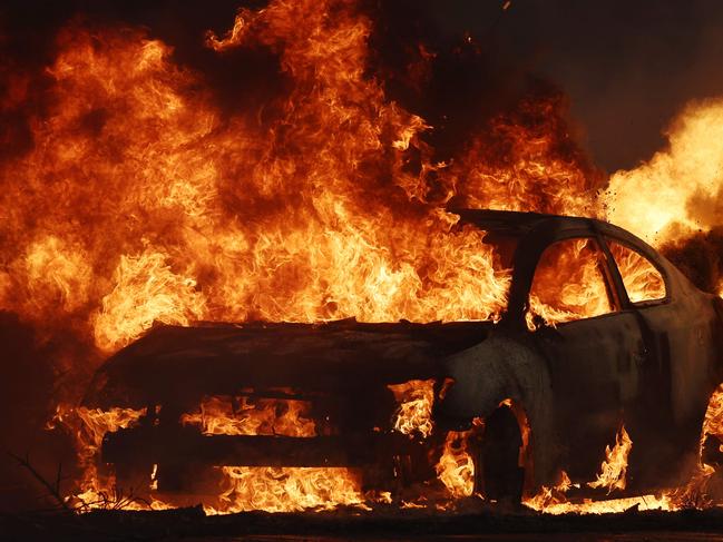 A vehicle on fire during the Eaton Fire. Picture: Getty Images