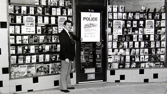 A Homicide Squad detective outside the Thornbury bookshop where Maria James was murdered in 1980.