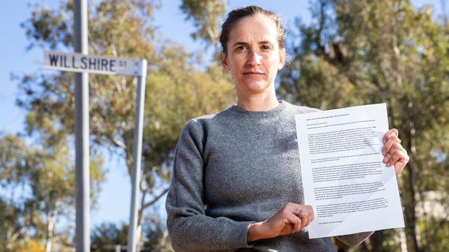 Suki Dorras-Walker with a letter she has written to the Alice Springs Town Council requesting that the name of Willshire St be changed. Picture: EMMA MURRAY