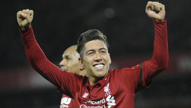 Liverpool's Roberto Firmino celebrates after scoring his hat-trick goal against Arsenal. Picture: AFP