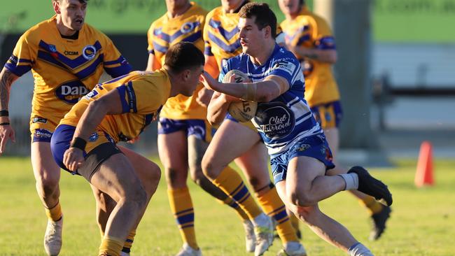 Kaleb Hocking charging at the line for the Thirroul Butchers. Picture: Steve Montgomery