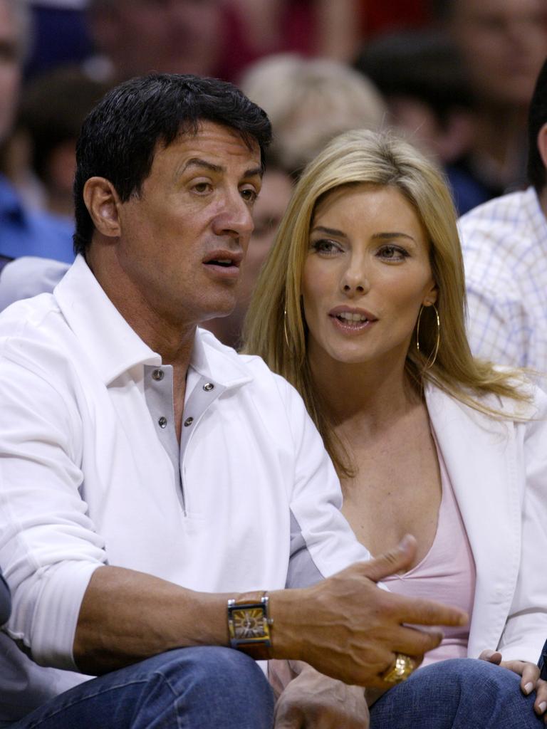 LOS ANGELES - MARCH 28:  Actor Sylvester Stallone and wife Jennifer Flavin attend the game between the Los Angeles Lakers and the Utah Jazz on March 28, 2004 in Los Angeles, California. (Photo by Vince Bucci/Getty Images)