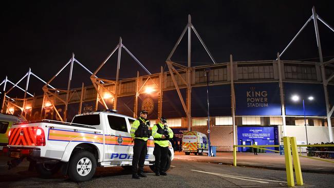 Police officers secure the area outside Leicester City Football Club's King Power Stadium