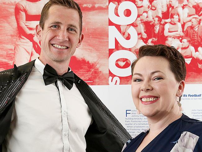 Western Bulldogs fashion parade for breast cancer.Patient Belinda Phelan with player Dale Morris at Whitten Oval. Picture : Ian Currie