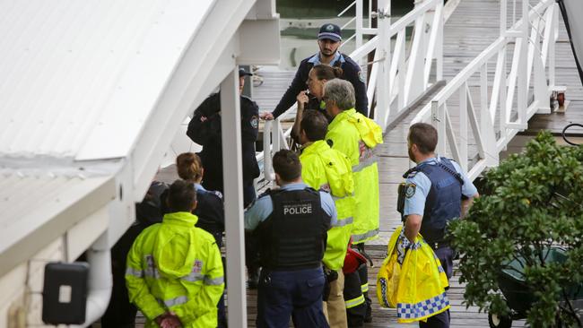 Emergency services discuss the explosion at the marina. Picture: Liam Driver