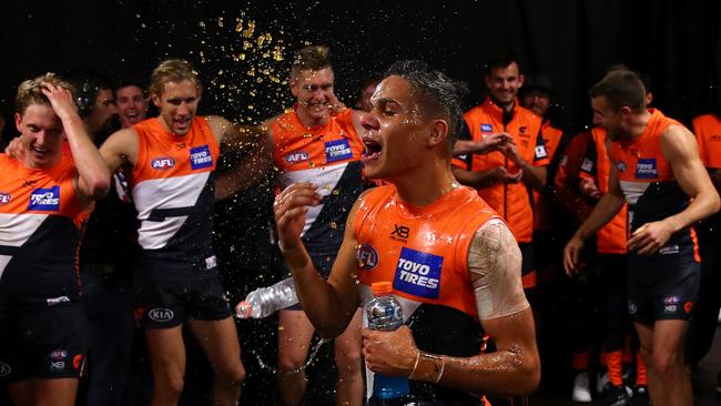 Bobby Hill celebrates his first win with the Giants. Picture: Cameron Spencer/Getty Images