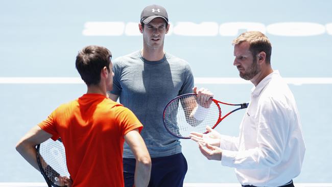 Andy Murray of England (right) is seen with Novak Djokovic of Serbia (left) during a training session at the Australian Open in Melbourne, Thursday, January 10, 2019. (AAP Image/Daniel Pockett) NO ARCHIVING, EDITORIAL USE ONLY