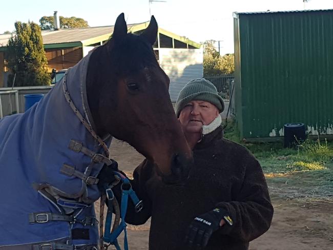 Port Augusta race horse owner Trevor Montgomerie is angry with Transport Department contractors who he says erected a submerged barbed wire fence which injured his horse 1000 degrees. Picture: supplied.