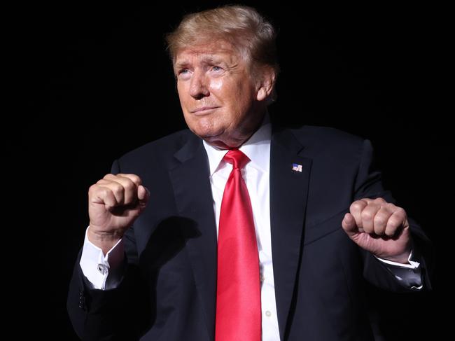 DES MOINES, IOWA - OCTOBER 09: Former President Donald Trump speaks to supporters during a rally at the Iowa State Fairgrounds on October 09, 2021 in Des Moines, Iowa. This is Trump's first rally in Iowa since the 2020 election.   Scott Olson/Getty Images/AFP == FOR NEWSPAPERS, INTERNET, TELCOS & TELEVISION USE ONLY ==