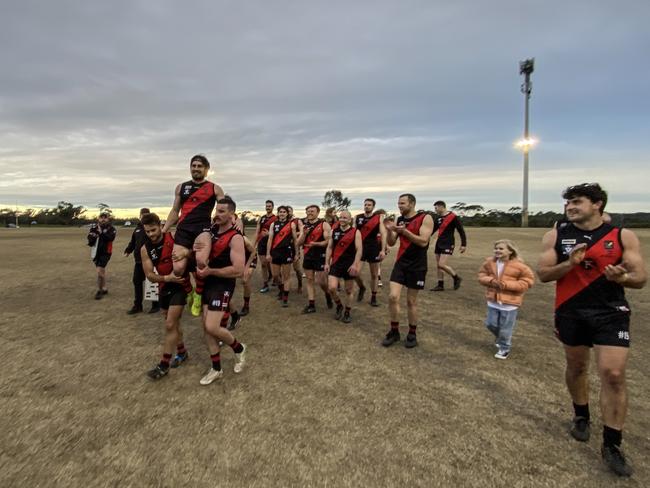 Dylan Sutton is chaired off after his 100th game for the Frankston Bombers. Picture: Valeriu Campan