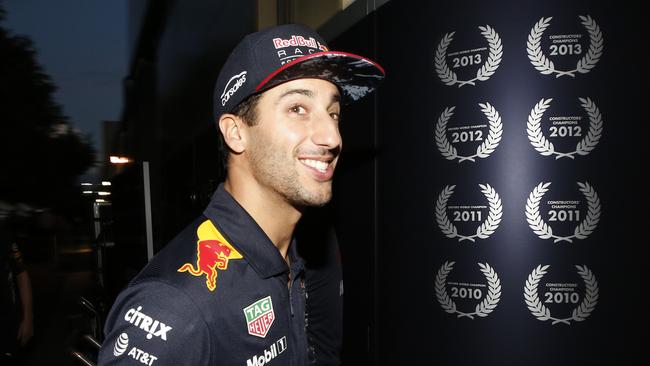 2017 Australian Grand Prix at Albert Park Saturday. Daniel Ricciardo after the crash walks back with dinner. Picture: David Caird