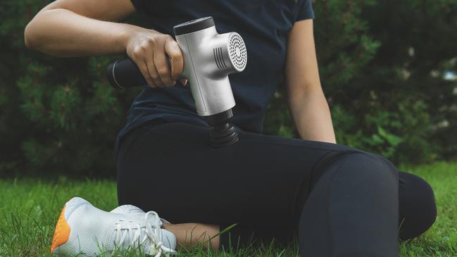 DIY massage guns apply rapid bursts of pressure into muscle tissue. Picture: istock