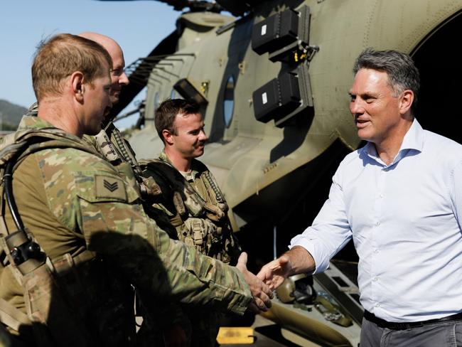 Deputy Prime Minister and Defence Minister Richard Marles and Minister for Defence Industry Patrick Conroy at RAAF Base Townsville where they inspected a CH-47 Chinook.