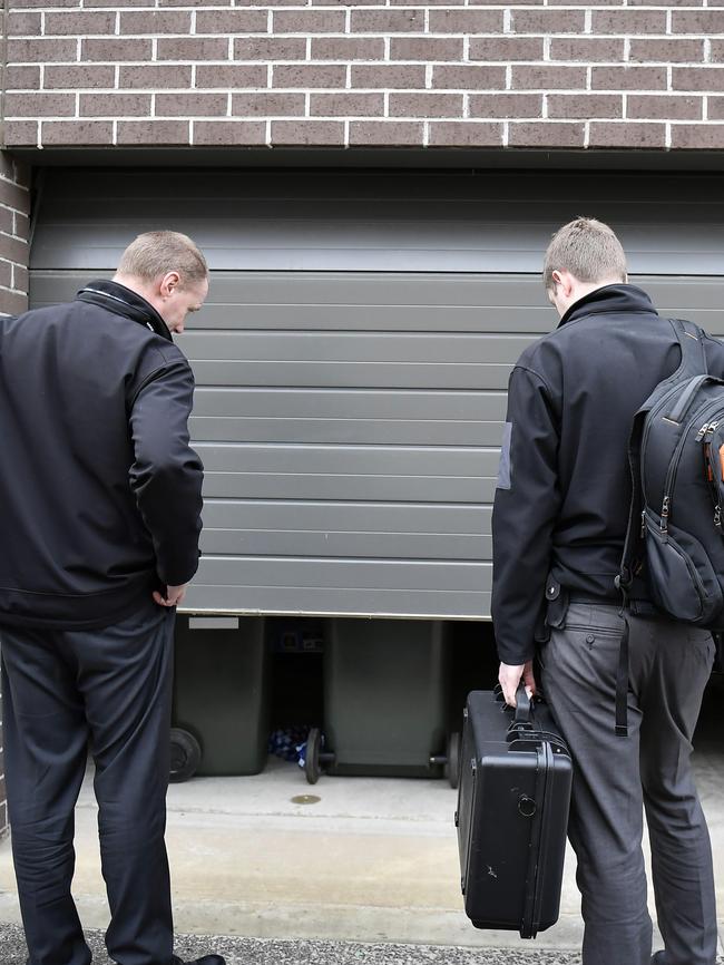 Detectives arrive at Mr Dank’s home. Picture: Andy Brownbill