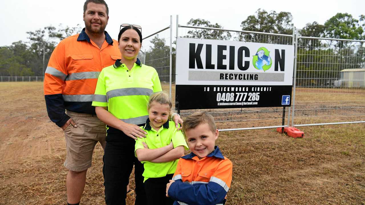 OPENING MONDAY: Dean, Kristie, Nevaeh and Dazarius Kleidon at the site of their new business, Kleicon Recycling. Picture: Mike Knott BUN070819KLE2