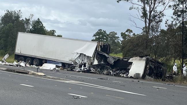 The Brisbane-based disaster victim identification squad were brought in to identify the truck drivers killed in a Bruce Highway crash near Maryborough which also claimed the life of a local man. Photo: Carlie Walker