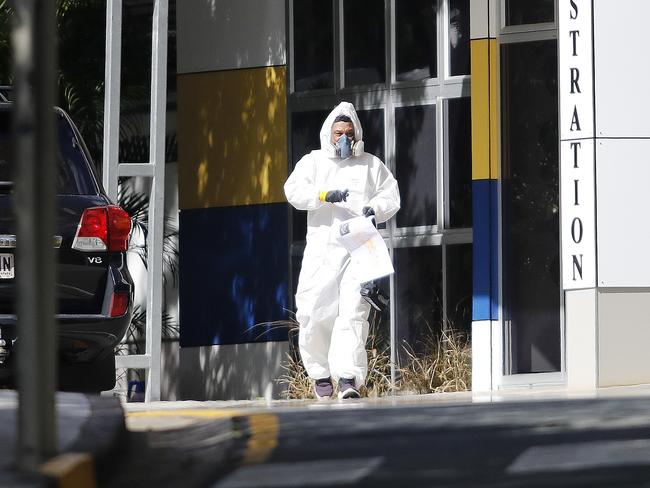 Covid cleaning crew pictured at Indooroopilly State High School pictured after it was closed due to a Covid-19 case. Picture: Josh Woning.