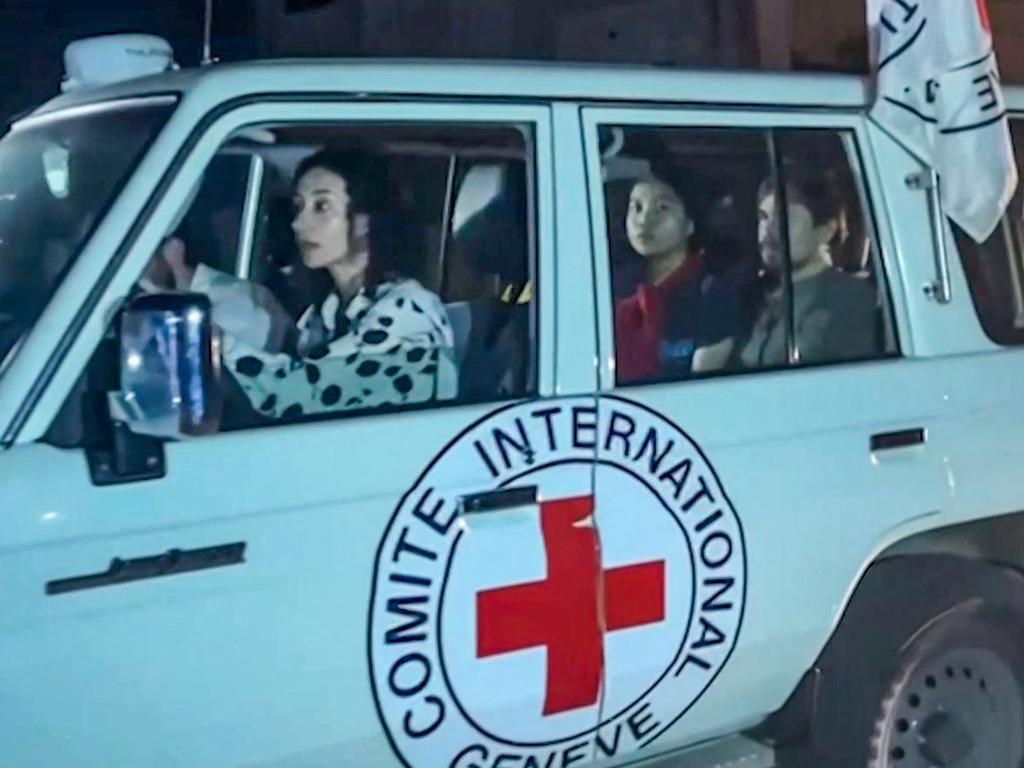 An International Red Cross vehicle reportedly carrying hostages released by Hamas crosses the Rafah border point in the Gaza Strip towards Egypt from where they would be flown to Israel to be reunited with their families. Picture: Mahmud Hams / AFPTV / AFP