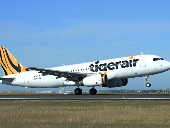 Tiger Airways becomes 'Tigerair' signalling a new era for the airline in Australia. The A320 aircraft was re-branded overnight and unveiled in-front of the media this morning in the Tiger hanger at Melbourne's Tullamarine Airport. The Tigerair A320 then departed to Alice Springs on its inaugural flight. CEO of Tigerair, Rob Sharp was at the unveiling in Melbourne. Picture: Morgan James