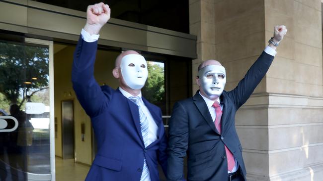 Brothers “A” (left) and “B” leave the District Court following the sentencing of child sex offender Vivian Frederick Deboo. Picture: Dean Martin/AAP