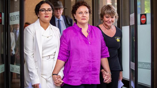 Ms Folbigg (middle) and her lawyer Rhanee Rego (left) have called for compensation for spending two decades in prison. Picture: NewsWire / Christian Gilles