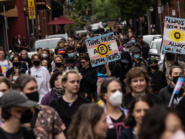 Pro-trans activists march towards Flinders Street Station. Picture: NewsWire / Diego Fedele
