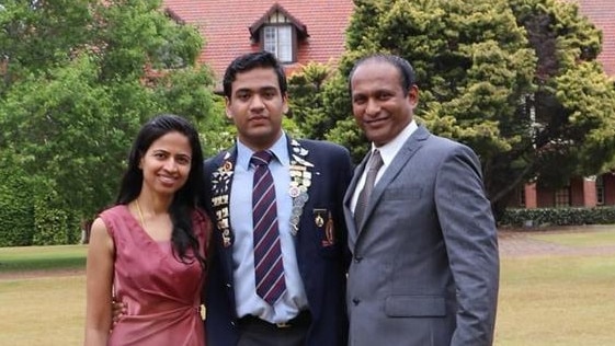 TSS student Vishaak Gangasandra, 17, with his parents. The Gold Coast student received an ATAR of 99.95.