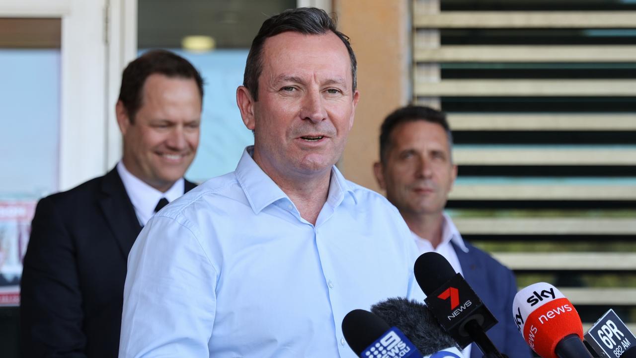 Western Australia Premiere Mark McGowan with police. Picture: Getty Images