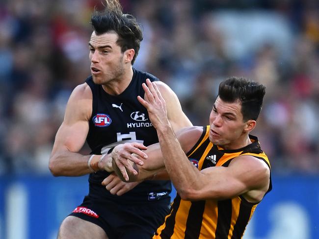 Lachie Plowman crashes into Jaeger O'Meara. Picture: Quinn Rooney/Getty Images