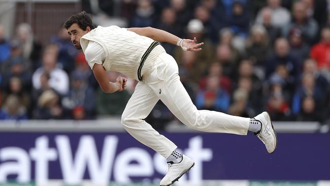 Mitchell Starc bends his back at Old Trafford last night. Picture: Getty Images