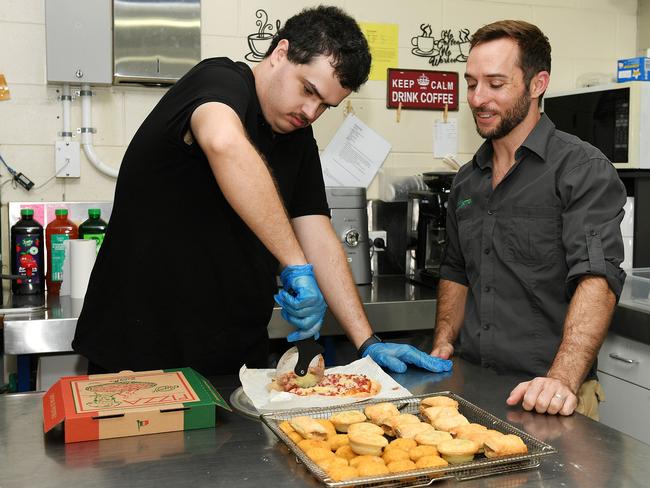 Kelso State School tuckshop staff member David Frewen-Lord and volunteer coordinator Ricky Esterquest. Picture: Shae Beplate.