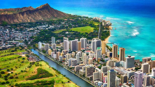 Explore Honolulu’s Waikiki Beach and hike Diamond Head before a cruise. Picture: iStock