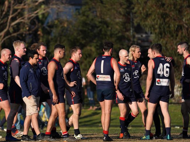 Disappointed Districts players after the grand final.