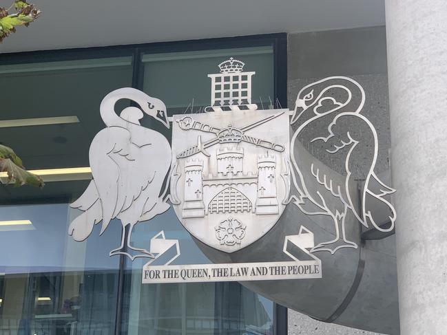 Generic image. The crest of the Australian Capital Territory outside the ACT Law Courts which houses the ACT Magistrates Court and the ACT Supreme Court . Picture: Julia Kanapathippillai