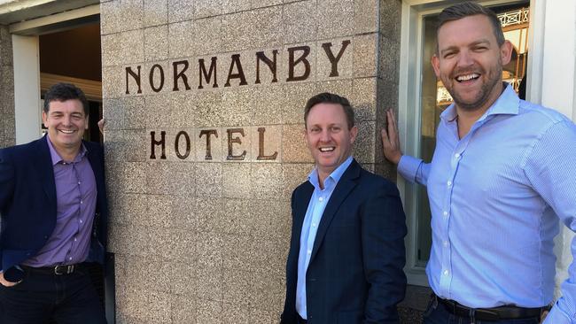 Jaz Mooney (left), managing director of Pelathon Management Group which has bought the lease, with CBRE Hotels director Paul Fraser (centre) and Winchester Group director Shaun Dunleavy, whose company will oversee the refurbishment of the Normanby Hotel. Picture: Darren Cartwright