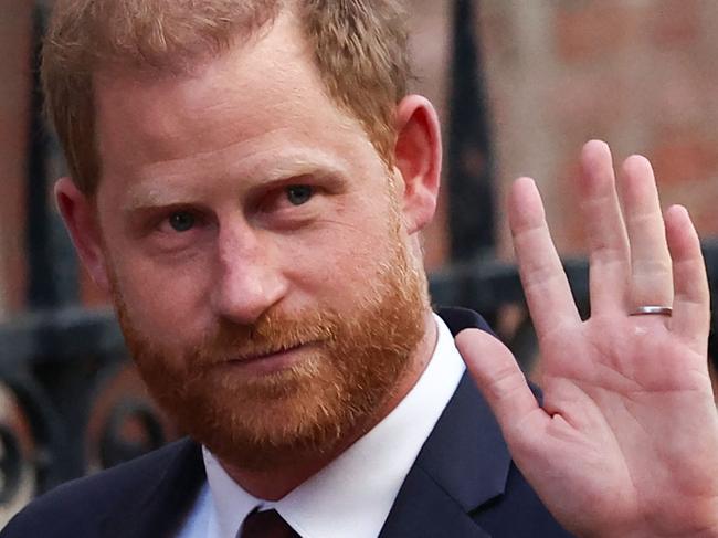 Britain's Prince Harry, Duke of Sussex waves as he departs the the Royal Courts of Justice, Britain's High Court, in central London, on April 9, 2025 following the second day of his appeal hearing to over the downgrading of his personal security during visits in Britain. Prince Harry's lawyer outlined in court threats made against him, including calls for his murder, as King Charles's youngest son appealed on April 8, 2025 against an 